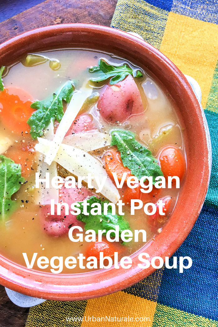 Hearty Vegan Instant Pot Garden Vegetable Soup - When the weather turns cool, this hearty, vegan Instant Pot® Garden Vegetable Soup is one of my favorite ways to warm up my insides. This recipe stars carrots, mushrooms, tomatoes, arugula, potatoes, celery and onions, however, this flexible “clean out the refrigerator” vegan soup recipe can be adapted in countless ways to include whatever fresh vegetables and herbs you happen to have on hand.  #veganrecipes  #vegansoups  #veganvegetablesoup  #instantpotsoup  #instantpotvegansoup  #plantbaseddiet 